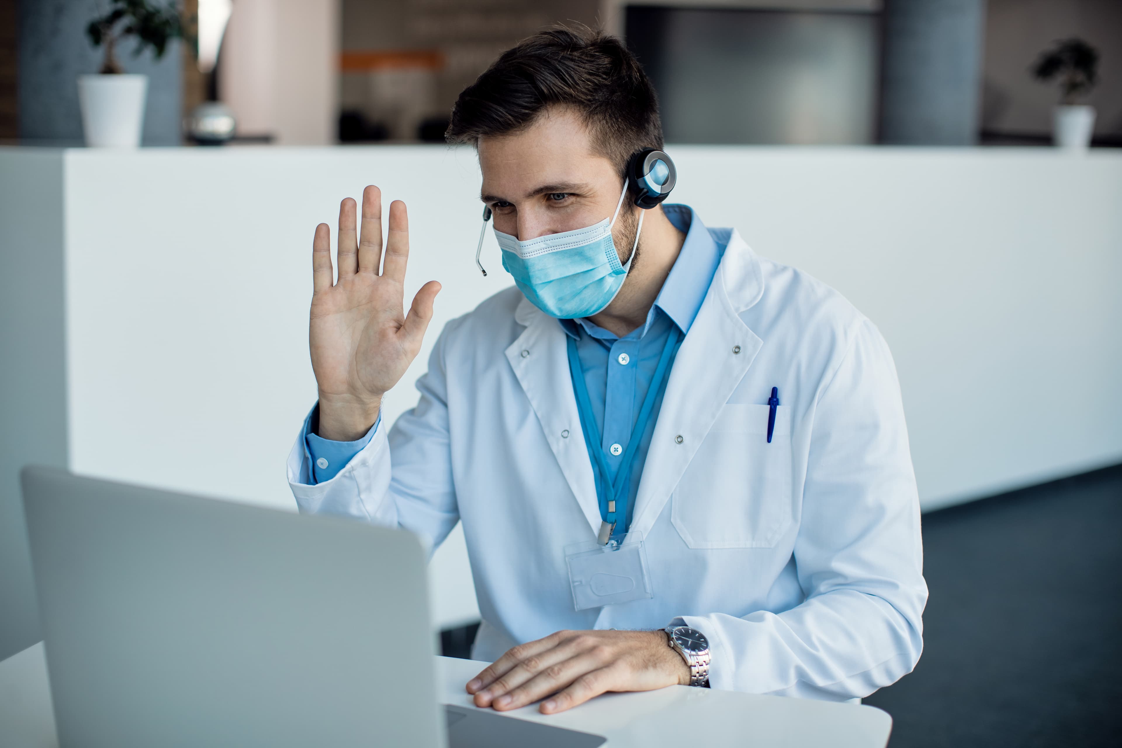 Doctor providing a friendly virtual consultation